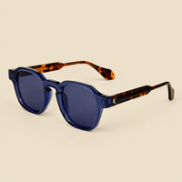 Blue geometric sunglasses with tortoise arms and dark lenses – The Zenith Blue